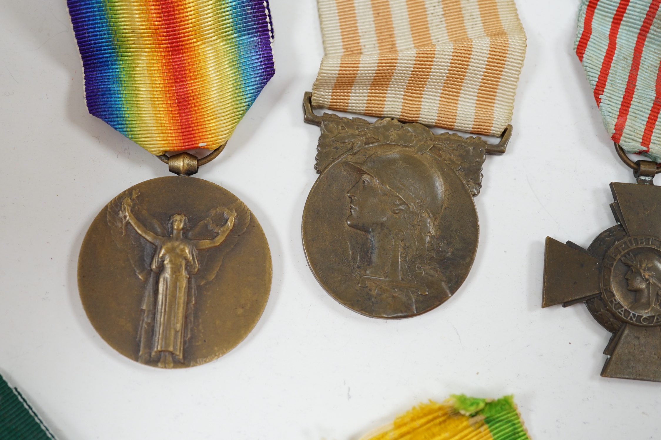 Eighteen French medals, including The War Cross, TOE French Legion Cross, Medal of Honour, Croix du Combatant Medal, WWI Commemorative Medal, 1870 Military Medal, 1914-18 Victory Medal, etc.